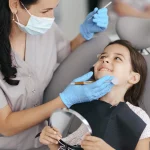 little-beautiful-girl-dentist-sm.webp